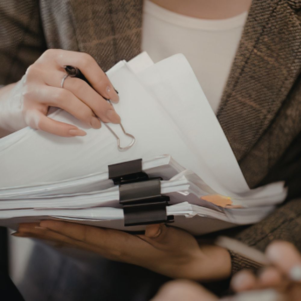 woman reviewing documents
